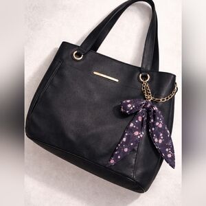 Elegant Black Tote Bag with Floral Scarf Accent